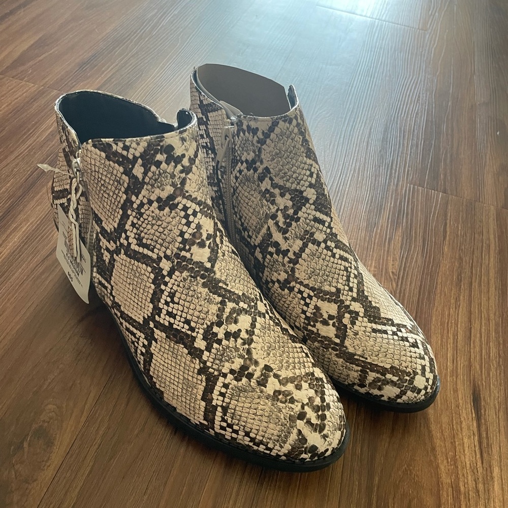 Brand new snake print boots . 8.5size